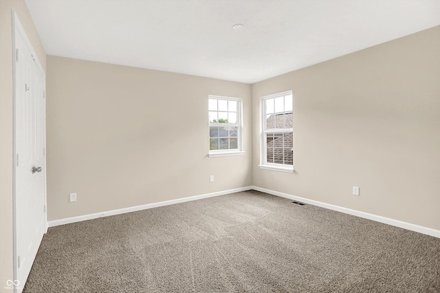 13528 Cuppertino Ln, Carmel, IN 46074 - empty room featuring carpet flooring