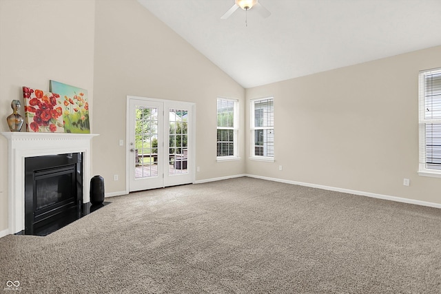 13528 Cuppertino Ln, Carmel, IN 46074 - unfurnished living room with high vaulted ceiling, carpet flooring, a ceiling fan, and a fireplace with flush hearth