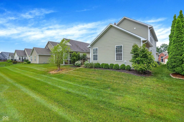 13528 Cuppertino Ln, Carmel, IN 46074 - rear view of house with a lawn