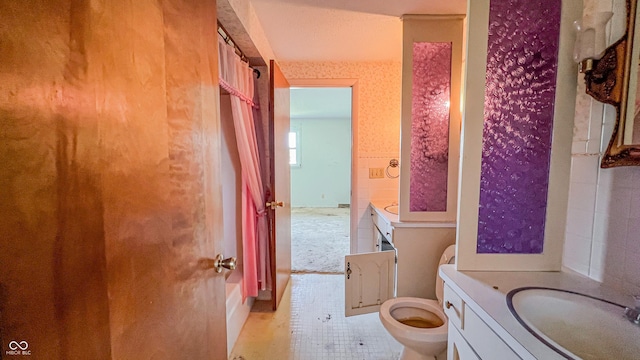 3215 E 10th St, Anderson, IN 46012 - bathroom featuring toilet and vanity