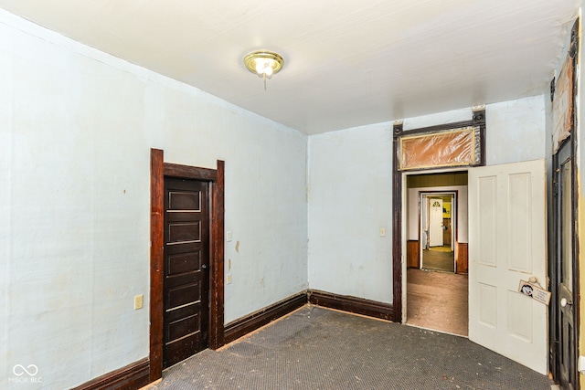 2009 S L St, Elwood, IN 46036 - unfurnished room featuring carpet floors and baseboards