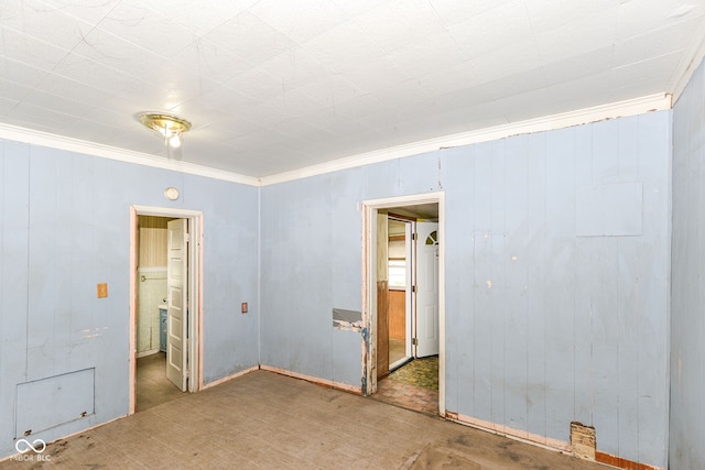 2009 S L St, Elwood, IN 46036 - spare room featuring ornamental molding