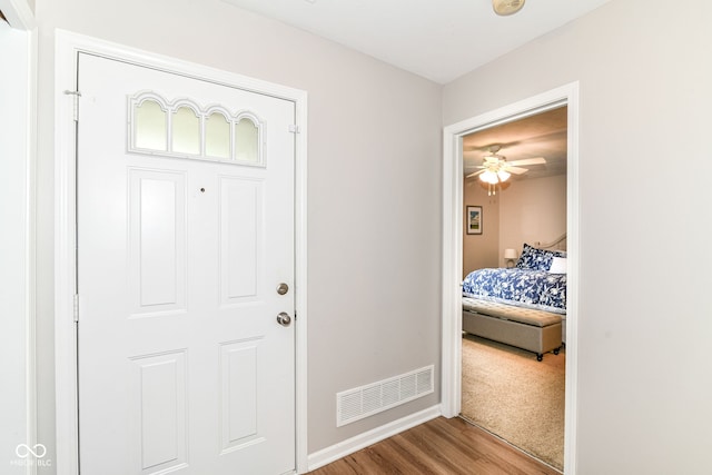 5651 Pine Knoll Blvd, Noblesville, IN 46062 - entryway with wood finished floors, baseboards, and a ceiling fan