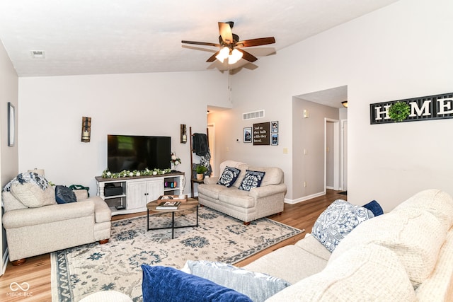 5651 Pine Knoll Blvd, Noblesville, IN 46062 - living room with lofted ceiling, a ceiling fan, wood finished floors, and baseboards