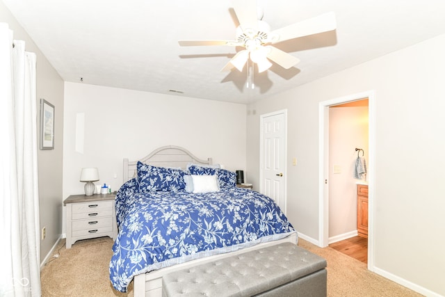 5651 Pine Knoll Blvd, Noblesville, IN 46062 - bedroom with light colored carpet, baseboards, and a ceiling fan