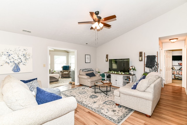 5651 Pine Knoll Blvd, Noblesville, IN 46062 - living room featuring vaulted ceiling, ceiling fan, and light wood-style flooring