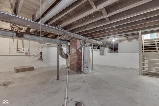 2945 N Denny St, Indianapolis, IN 46218 - unfinished basement featuring gas water heater and electric panel