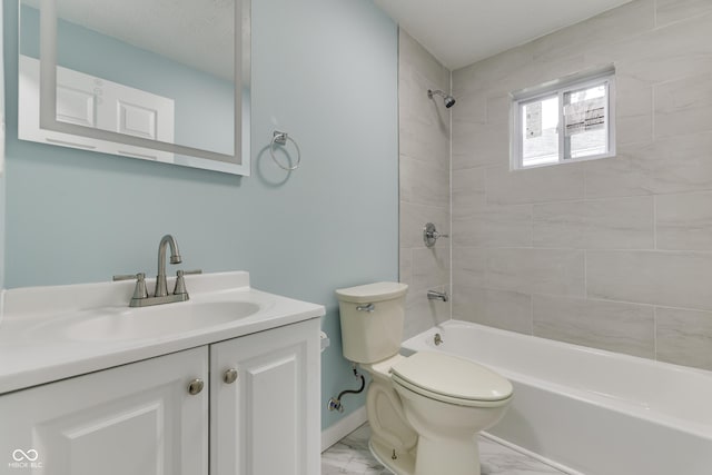 2945 N Denny St, Indianapolis, IN 46218 - full bathroom featuring marble look tile flooring, toilet, vanity, shower / bathtub combination, and baseboards