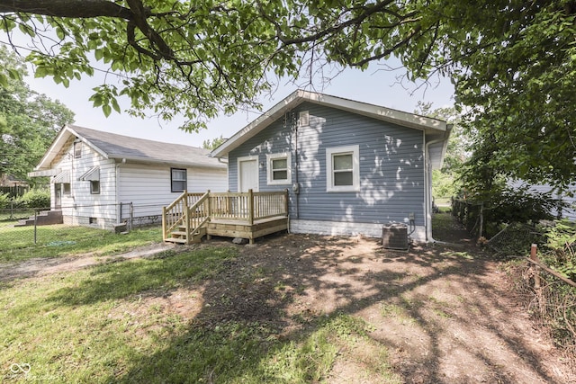 2945 N Denny St, Indianapolis, IN 46218 - rear view of property featuring a deck and cooling unit