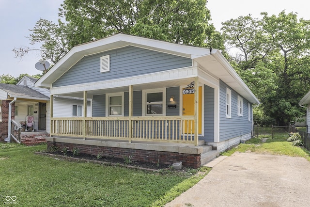 2945 N Denny St, Indianapolis, IN 46218 - view of front facade featuring covered porch