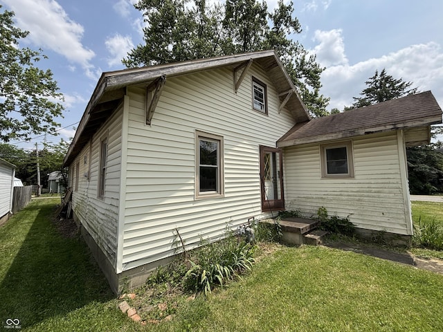 1201 N Canal St, Alexandria, IN 46001 - back of house featuring a yard