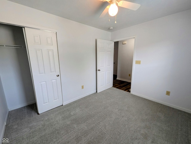 581 Grassy Bend Dr, Greenwood, IN 46143 - unfurnished bedroom with carpet floors, baseboards, a closet, and a ceiling fan