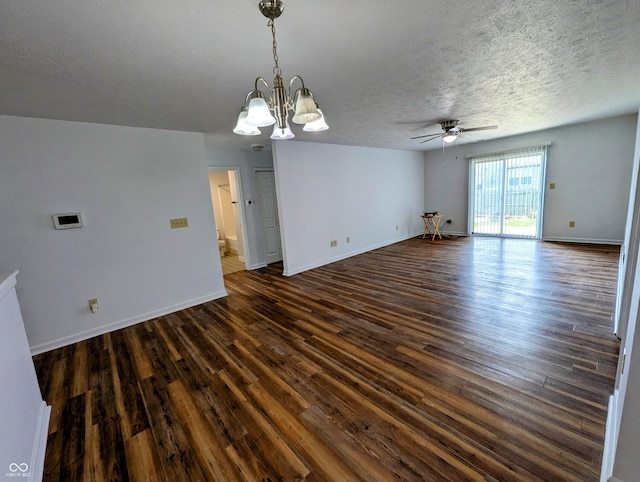581 Grassy Bend Dr, Greenwood, IN 46143 - unfurnished room featuring a ceiling fan, dark wood-style flooring, baseboards, a chandelier, and a textured ceiling