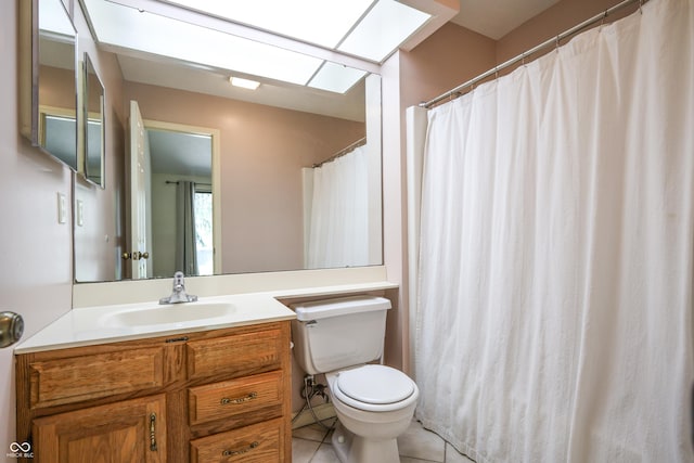 4462 Carya Sq, Columbus, IN 47201 - full bathroom featuring toilet, vanity, tile patterned floors, and a skylight