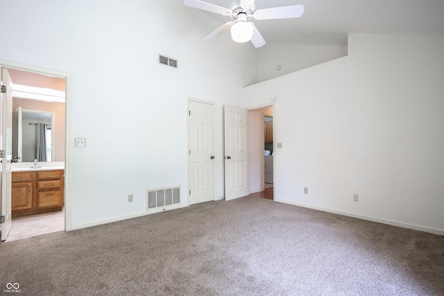 4462 Carya Sq, Columbus, IN 47201 - unfurnished bedroom featuring light colored carpet, high vaulted ceiling, baseboards, and ensuite bath