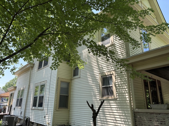 48 N Audubon Rd, Indianapolis, IN 46219 - view of side of home with a cooling unit