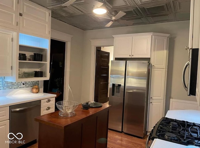 48 N Audubon Rd, Indianapolis, IN 46219 - kitchen featuring stainless steel appliances, an ornate ceiling, white cabinetry, a ceiling fan, and butcher block counters