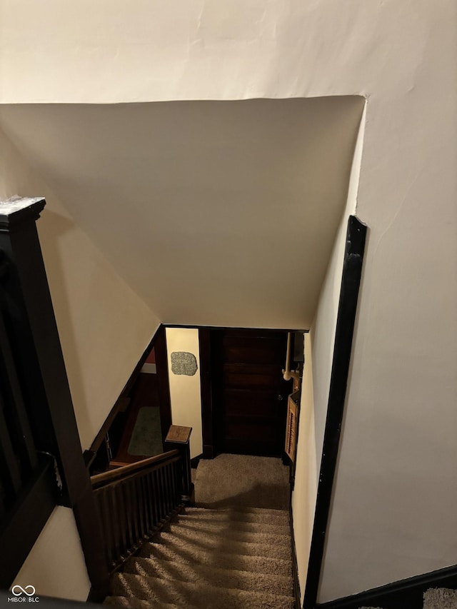 48 N Audubon Rd, Indianapolis, IN 46219 - stairs featuring carpet and lofted ceiling