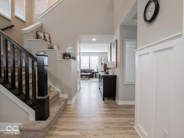 5684 Autumn Trl, Brownsburg, IN 46112 - entryway featuring wood finished floors, baseboards, stairs, recessed lighting, and a towering ceiling