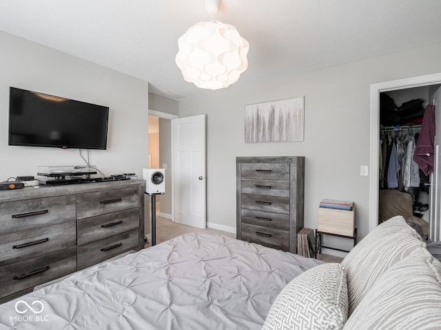 5684 Autumn Trl, Brownsburg, IN 46112 - bedroom featuring light carpet, baseboards, and a closet