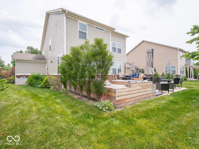 5684 Autumn Trl, Brownsburg, IN 46112 - rear view of property with a patio and an outdoor hangout area