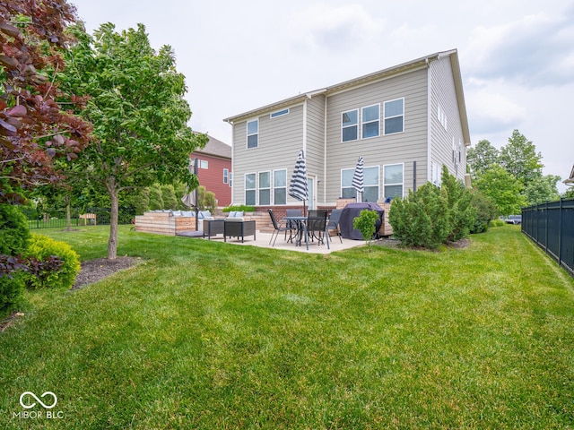 5684 Autumn Trl, Brownsburg, IN 46112 - back of house with an outdoor living space and a patio