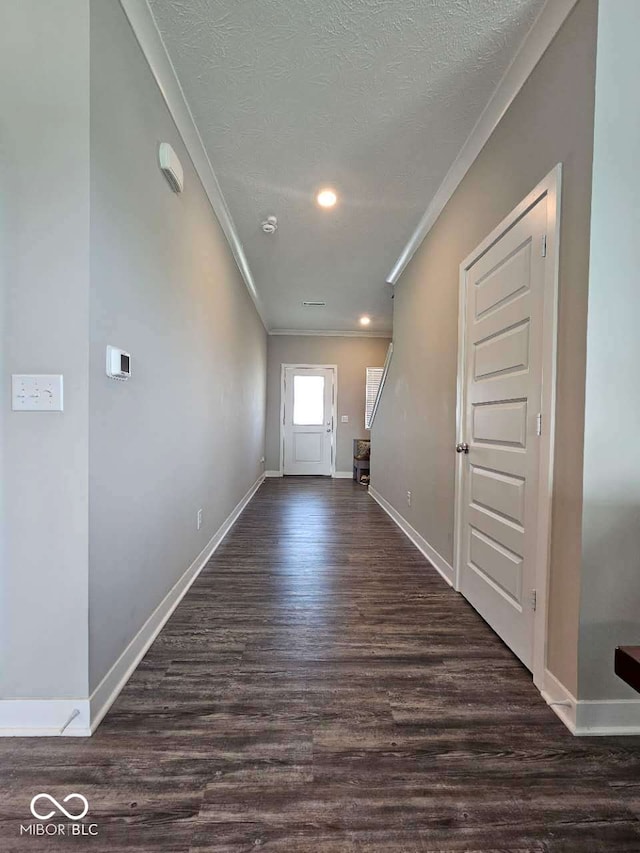 17255 Seaboard Pl, Noblesville, IN 46060 - entrance foyer with ornamental molding, wood finished floors, a textured ceiling, and recessed lighting