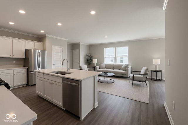 17255 Seaboard Pl, Noblesville, IN 46060 - kitchen featuring appliances with stainless steel finishes, ornamental molding, dark wood-type flooring, light countertops, and recessed lighting