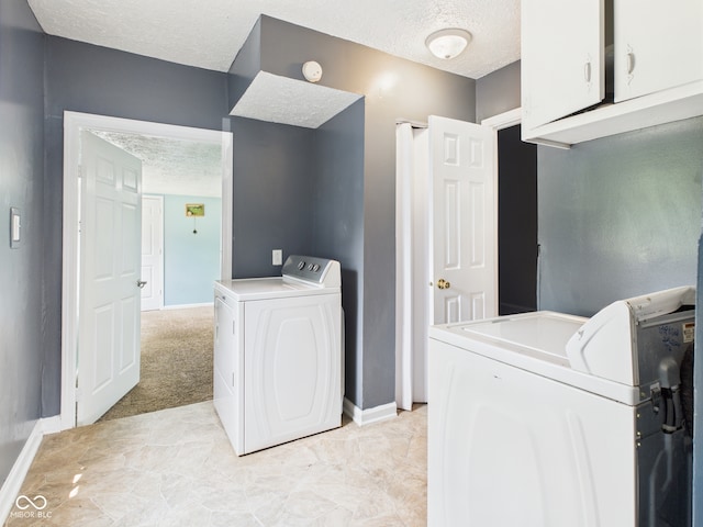 4020 N Mitthoefer Rd, Indianapolis, IN 46235 - washroom with washing machine and dryer, a textured ceiling, and baseboards
