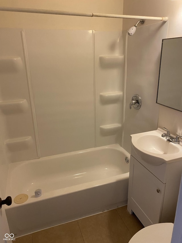 1444 N Denny St, Indianapolis, IN 46201 - bathroom featuring tile patterned flooring, vanity, washtub / shower combination, and toilet