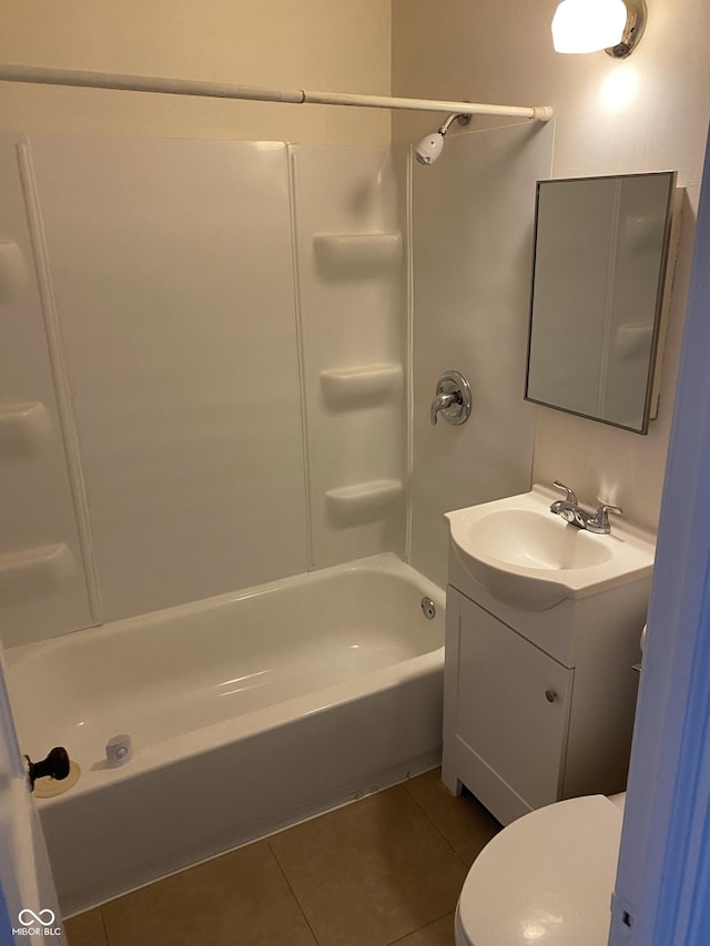 1444 N Denny St, Indianapolis, IN 46201 - full bath with toilet, vanity, tile patterned flooring, and bathing tub / shower combination