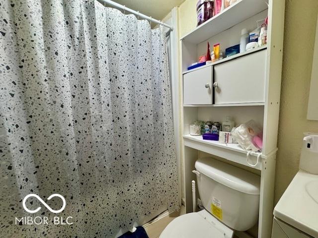 1118 S 2nd St, Lafayette, IN 47905 - full bathroom featuring toilet, curtained shower, and vanity