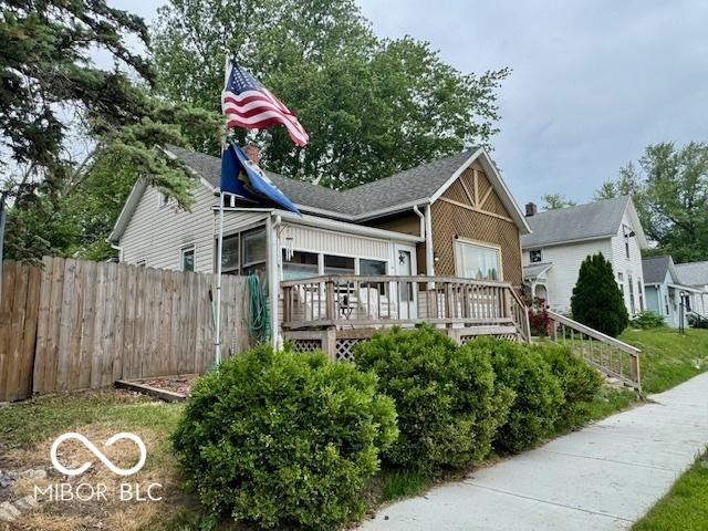 1118 S 2nd St, Lafayette, IN 47905 - view of front facade featuring a deck, a sunroom, and stairway