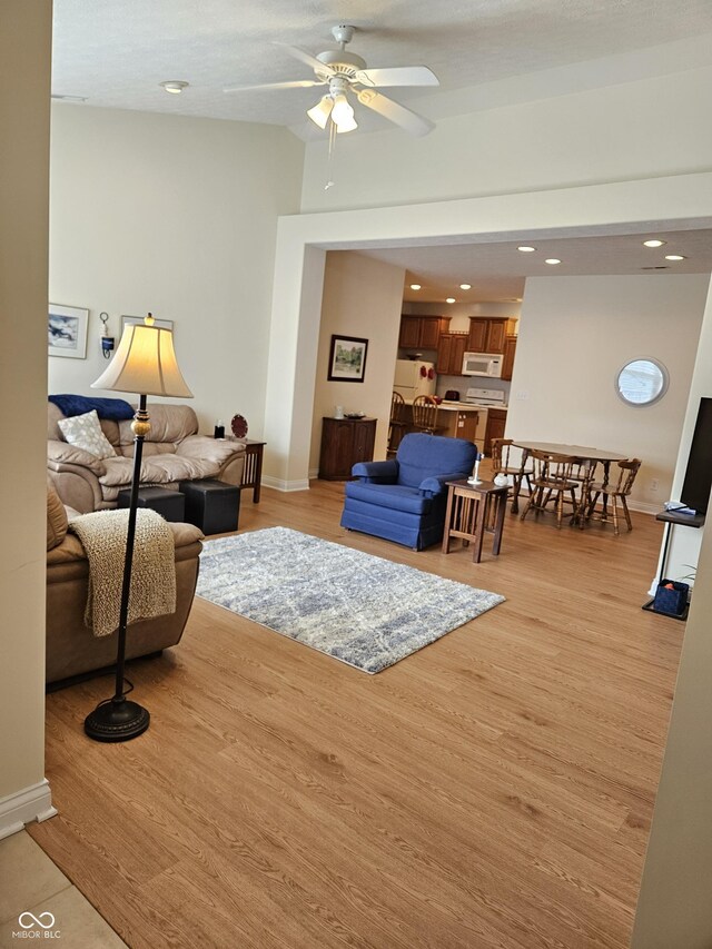 6956 Park Square Dr Unit D, Avon, IN 46123 - living area with ceiling fan, light wood-type flooring, baseboards, and recessed lighting
