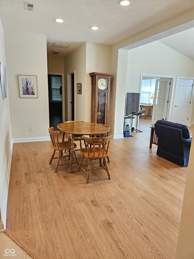 6956 Park Square Dr Unit D, Avon, IN 46123 - dining area with light wood-style flooring, recessed lighting, baseboards, and a textured ceiling
