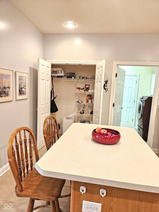 6956 Park Square Dr Unit D, Avon, IN 46123 - dining room featuring tile patterned floors and washing machine and dryer