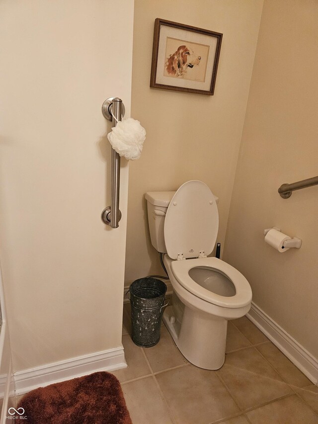 6956 Park Square Dr Unit D, Avon, IN 46123 - bathroom featuring toilet, tile patterned flooring, and baseboards