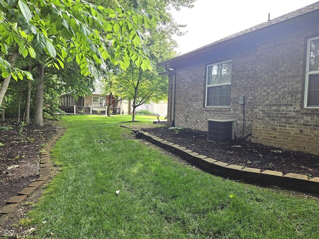 6956 Park Square Dr Unit D, Avon, IN 46123 - view of grassy yard featuring central AC