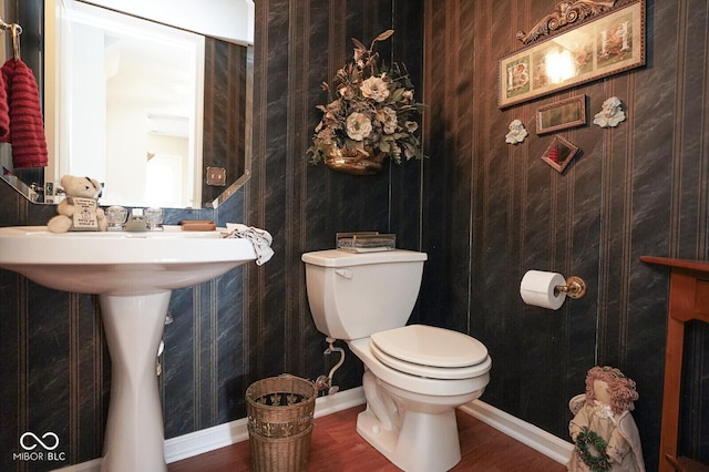 4342 Sequoia Ct, Greenwood, IN 46143 - half bathroom with toilet, wood finished floors, and baseboards