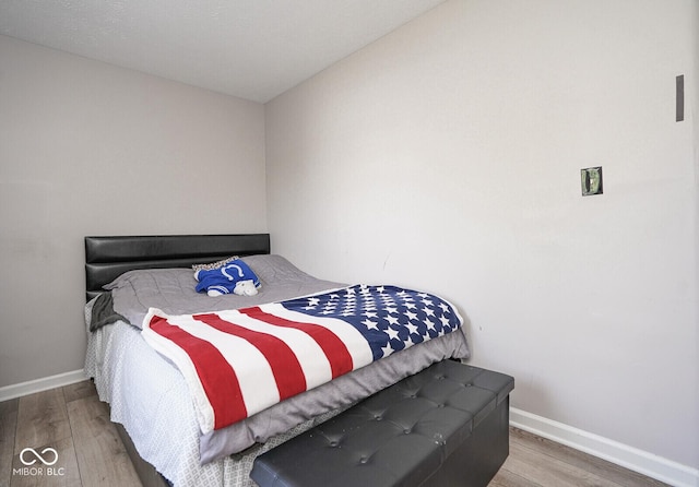 4342 Sequoia Ct, Greenwood, IN 46143 - bedroom featuring wood finished floors and baseboards