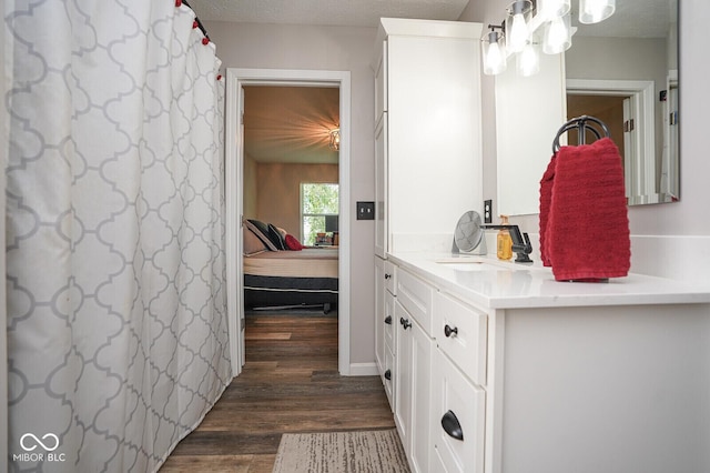 4342 Sequoia Ct, Greenwood, IN 46143 - ensuite bathroom with vanity and wood finished floors