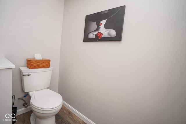 4342 Sequoia Ct, Greenwood, IN 46143 - bathroom with wood finished floors, toilet, and baseboards