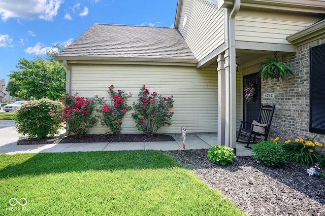 4342 Sequoia Ct, Greenwood, IN 46143 - view of side of property with a shingled roof and a lawn