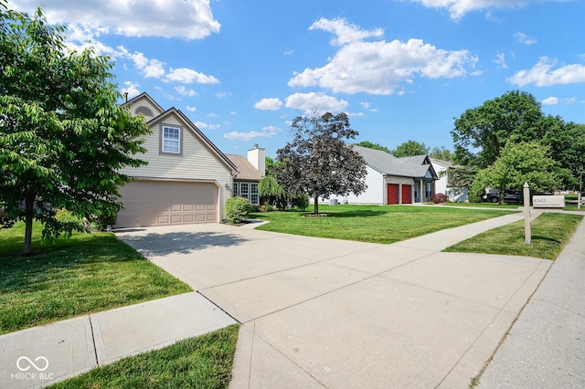 4342 Sequoia Ct, Greenwood, IN 46143 - view of property hidden behind natural elements with concrete driveway, a front yard, an attached garage, and a chimney