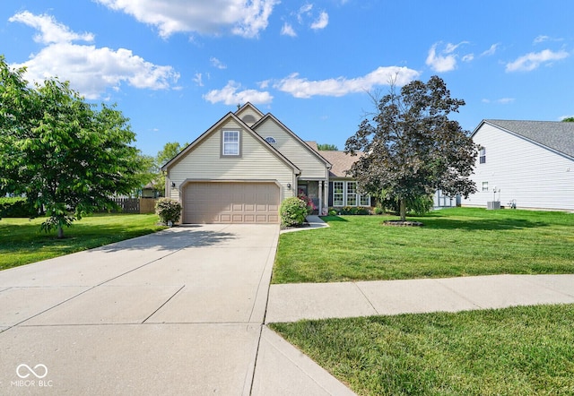 4342 Sequoia Ct, Greenwood, IN 46143 - traditional-style home with concrete driveway, a front lawn, a garage, and central AC