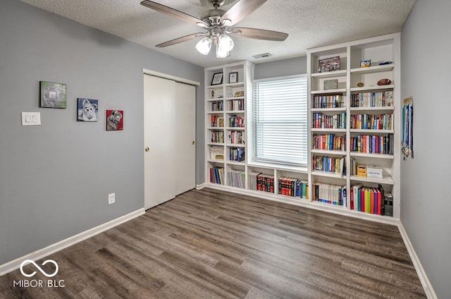 7657 Wheatgrass Ln, Noblesville, IN 46062 - unfurnished room featuring a ceiling fan, wood finished floors, a textured ceiling, and baseboards