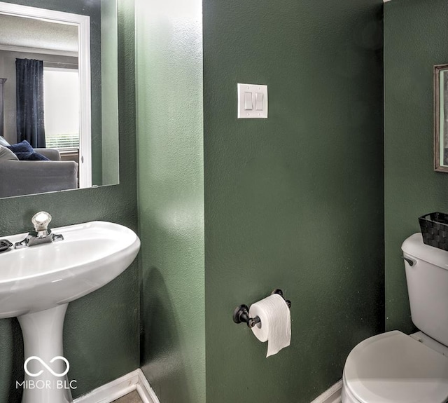 7657 Wheatgrass Ln, Noblesville, IN 46062 - bathroom with toilet and a textured wall