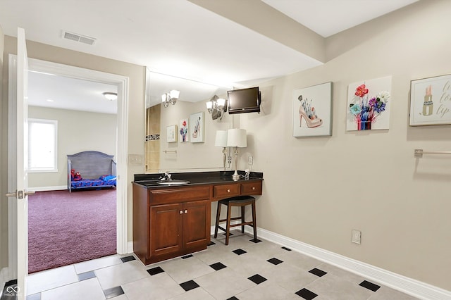 7635 Monte Carlo Way, Indianapolis, IN 46278 - bathroom featuring baseboards and vanity
