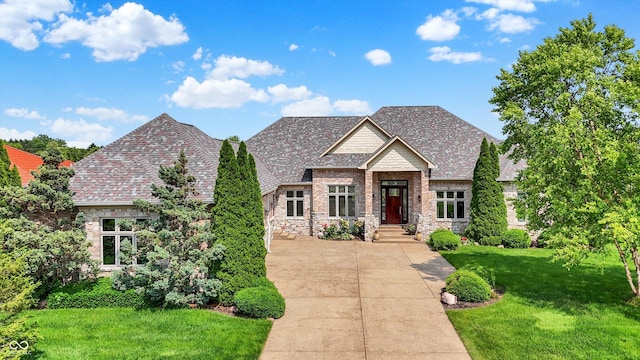 7635 Monte Carlo Way, Indianapolis, IN 46278 - view of front of property featuring a front yard and stone siding