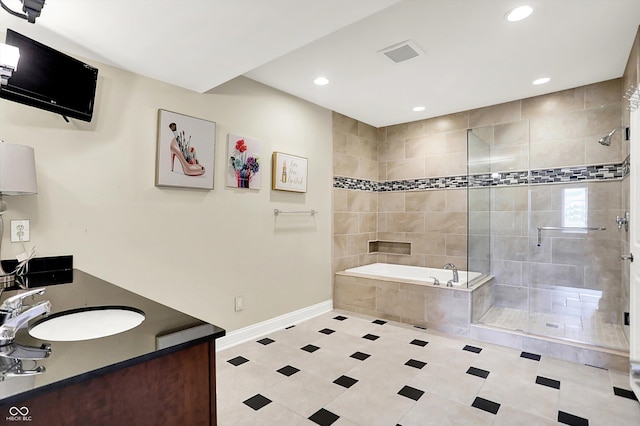 7635 Monte Carlo Way, Indianapolis, IN 46278 - full bathroom featuring a stall shower, recessed lighting, a bath, vanity, and tile patterned flooring